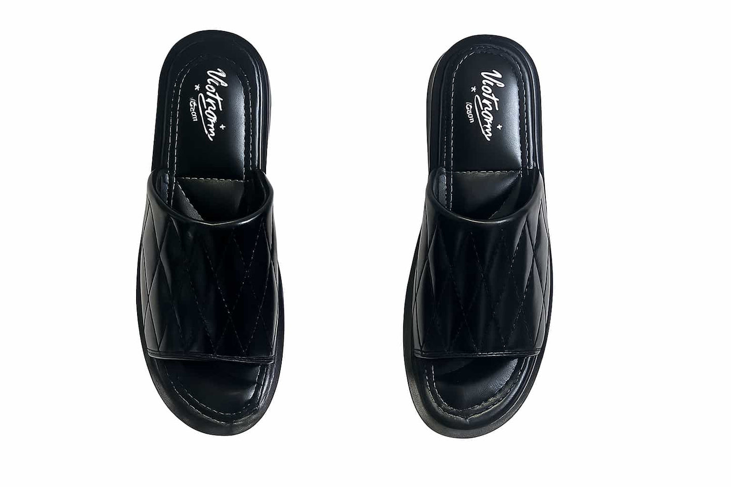 Pair of black slippers with 'Vietnam' branding on a white background