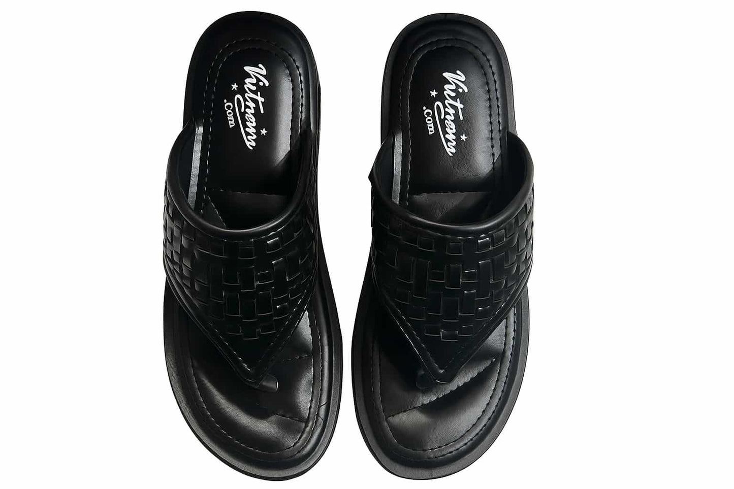 Pair of black woven slippers with 'Vietnam' branding on a white background