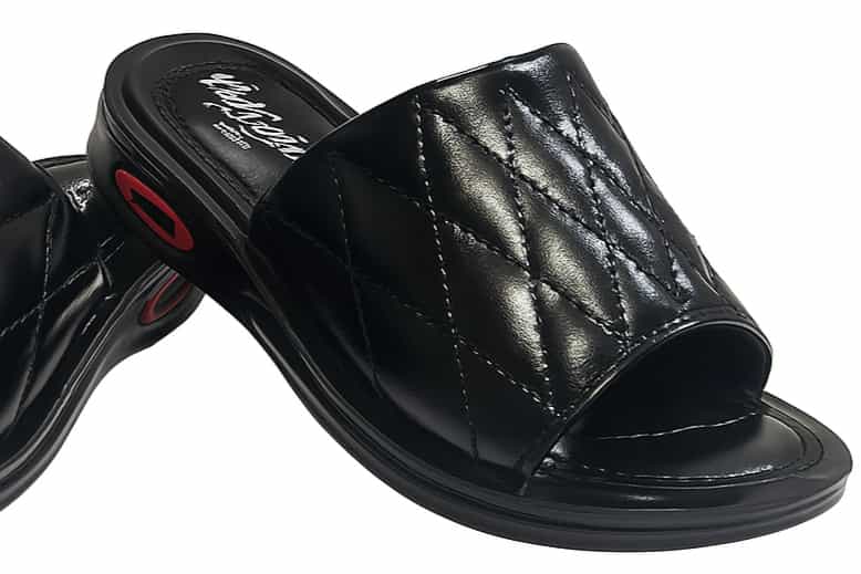 Black slippers with open toe on a white background