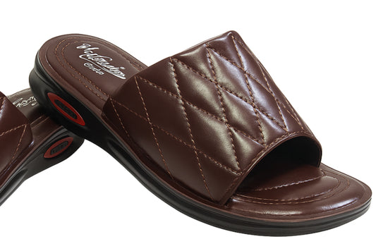 Brown slippers with quilted design on a white background