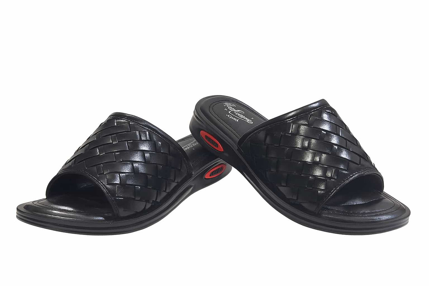 Pair of black woven slippers on a white background
