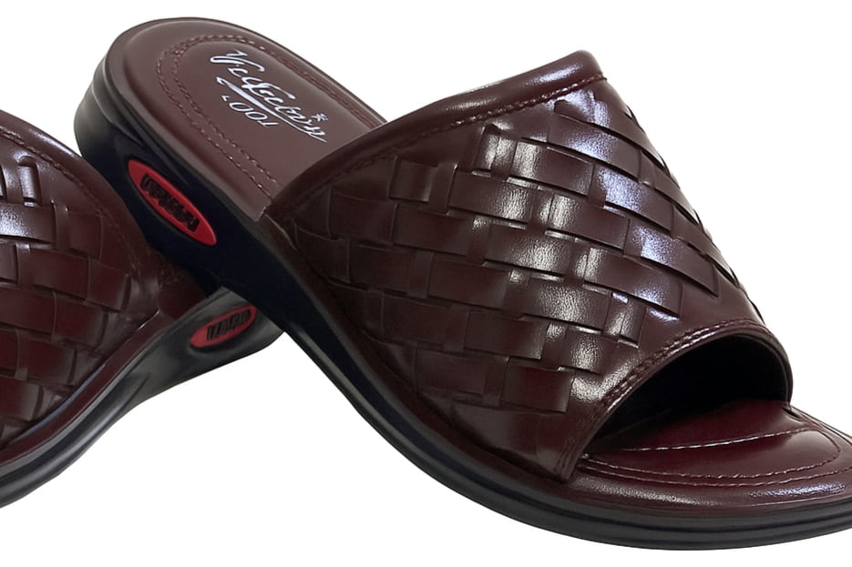 Brown woven slide slippers on a white background