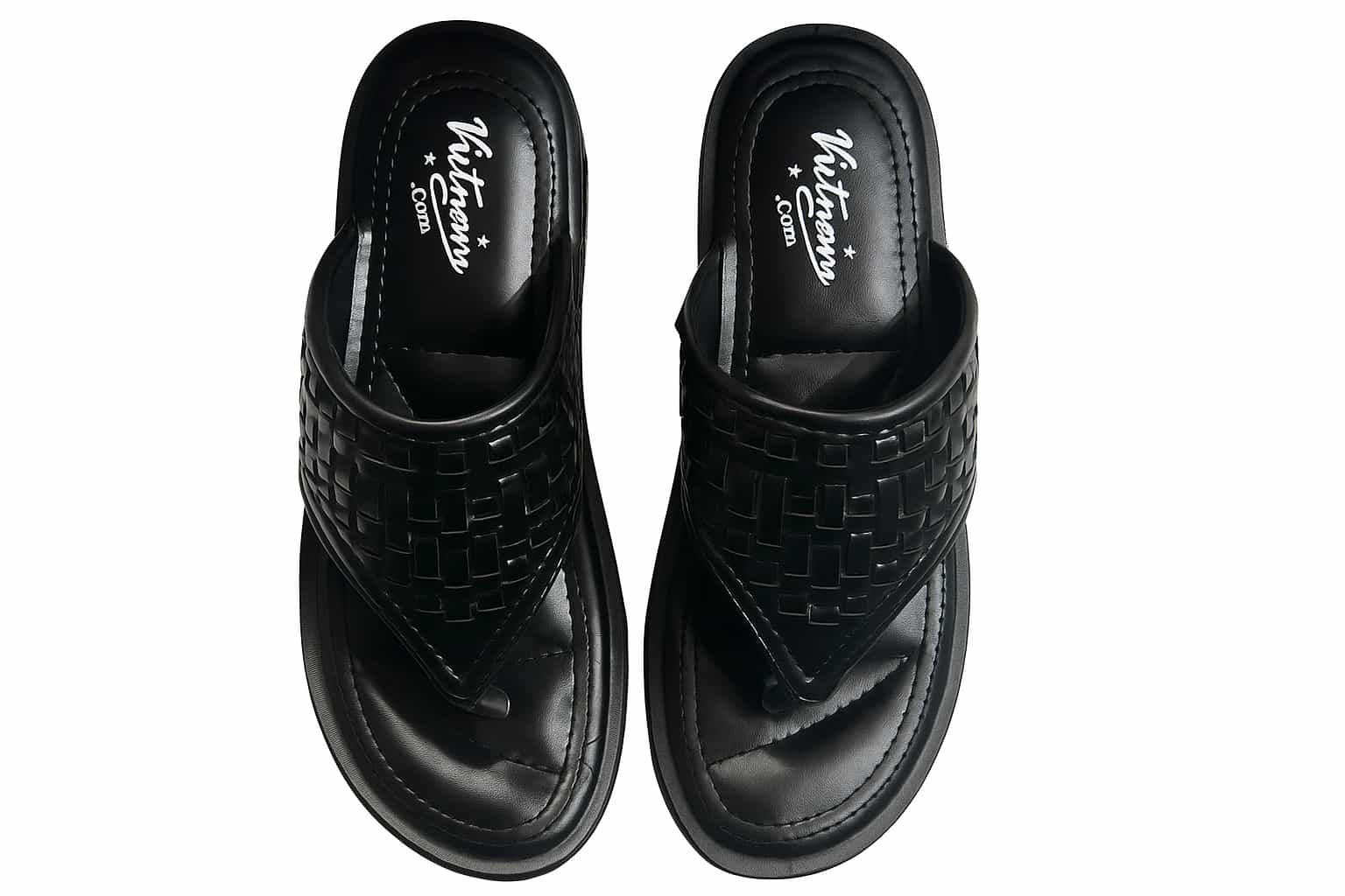 Pair of black woven slippers with 'Vietnam' branding on a white background