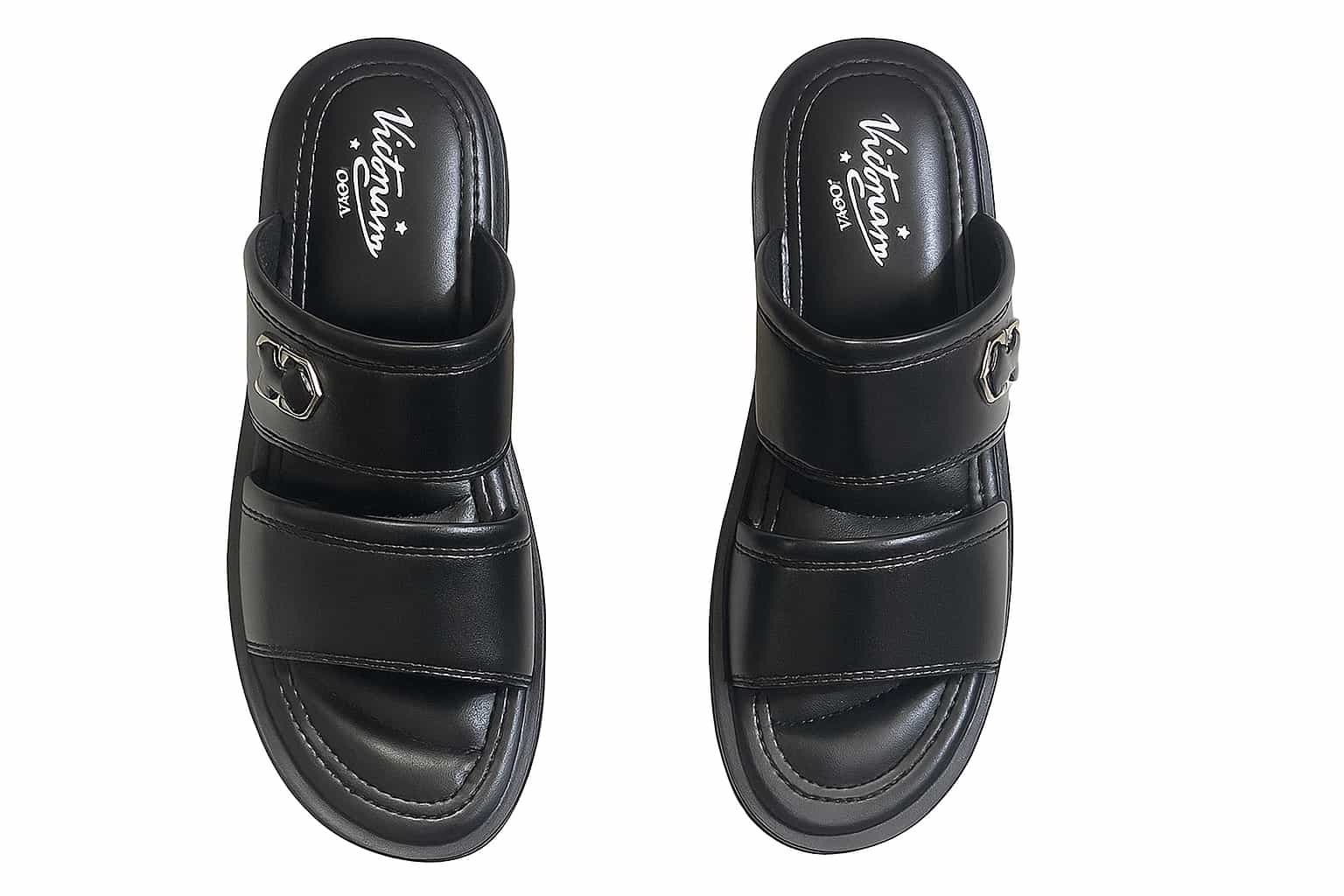 Pair of black slippers with a brand logo on a white background
