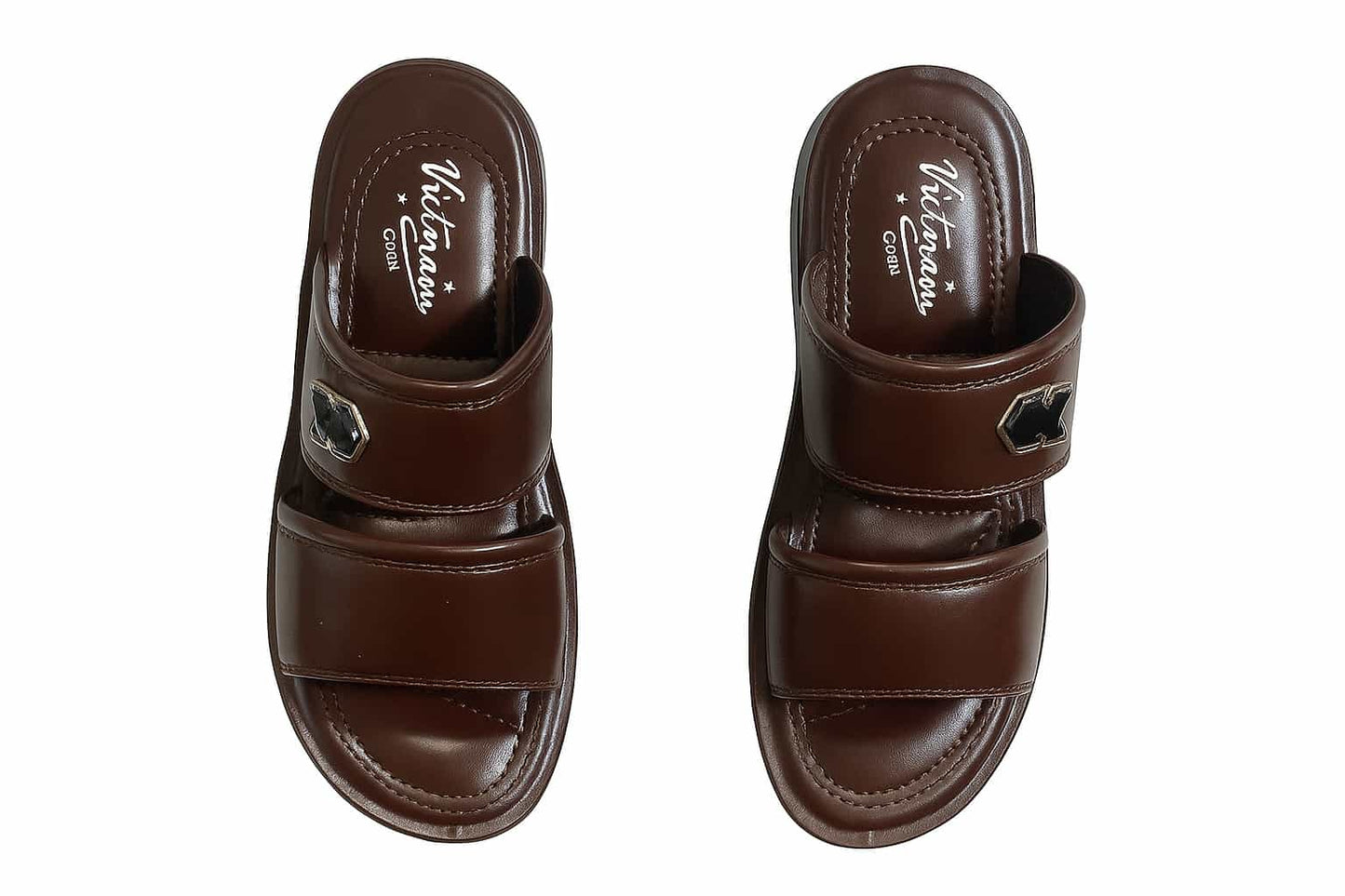 Pair of brown slippers with 'Vietnam' branding on a white background
