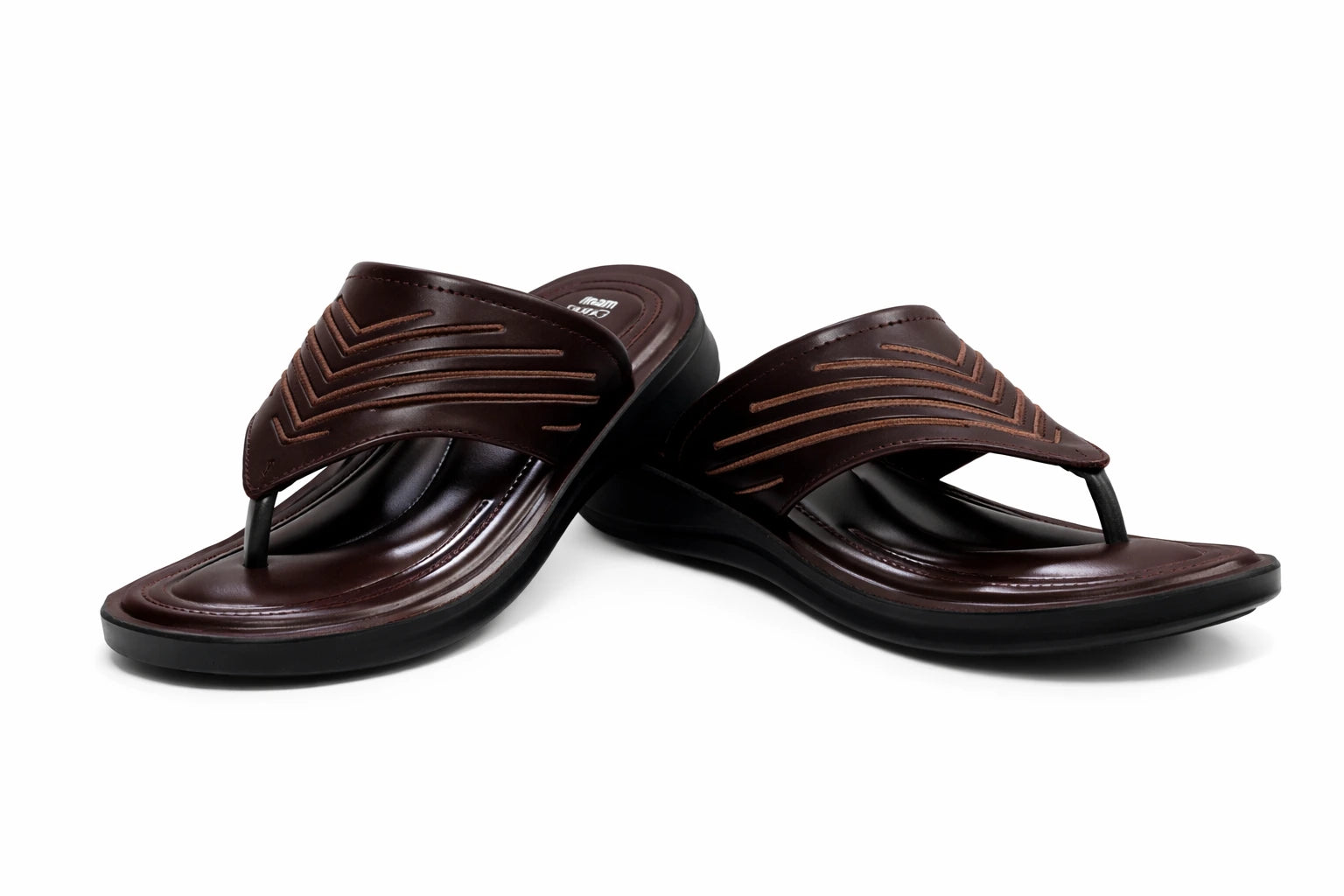 Pair of brown slippers on a white background