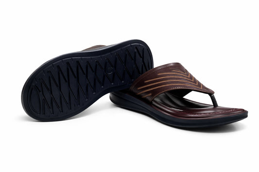 Brown slippers with black sole on a white background