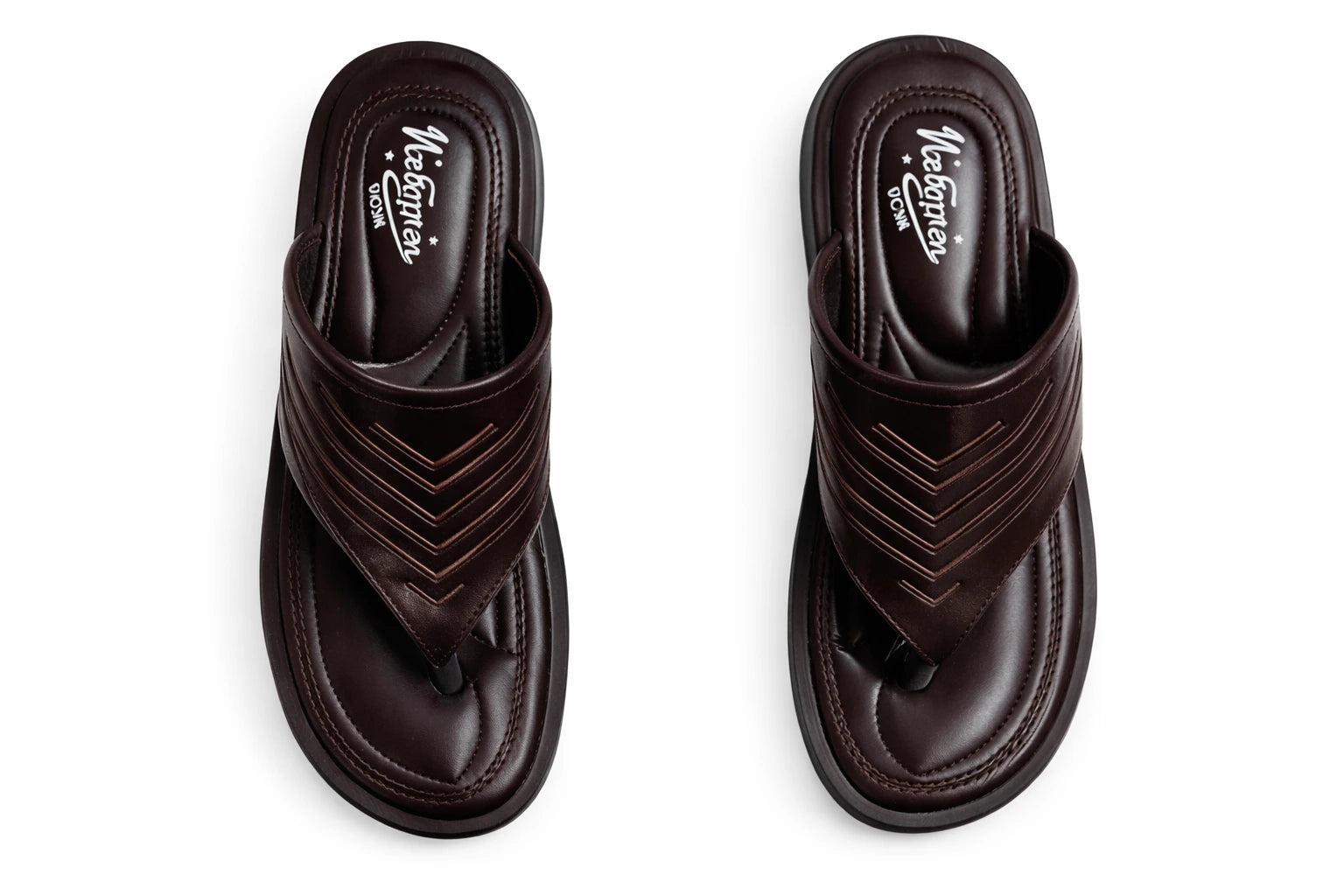 Pair of brown slippers with 'vietnam' branding on a white background